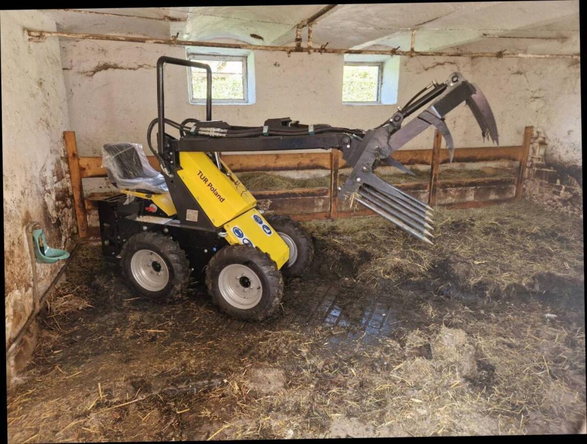 Gebrauchter Hoflader 1