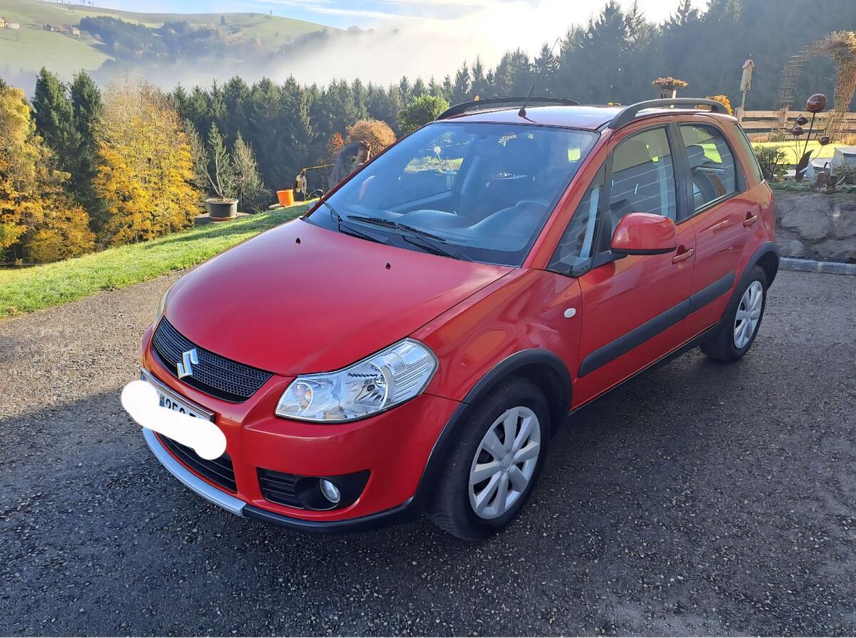 Suzuki SX4 Diesel Allrad 120 PS mit Parkschaden 2
