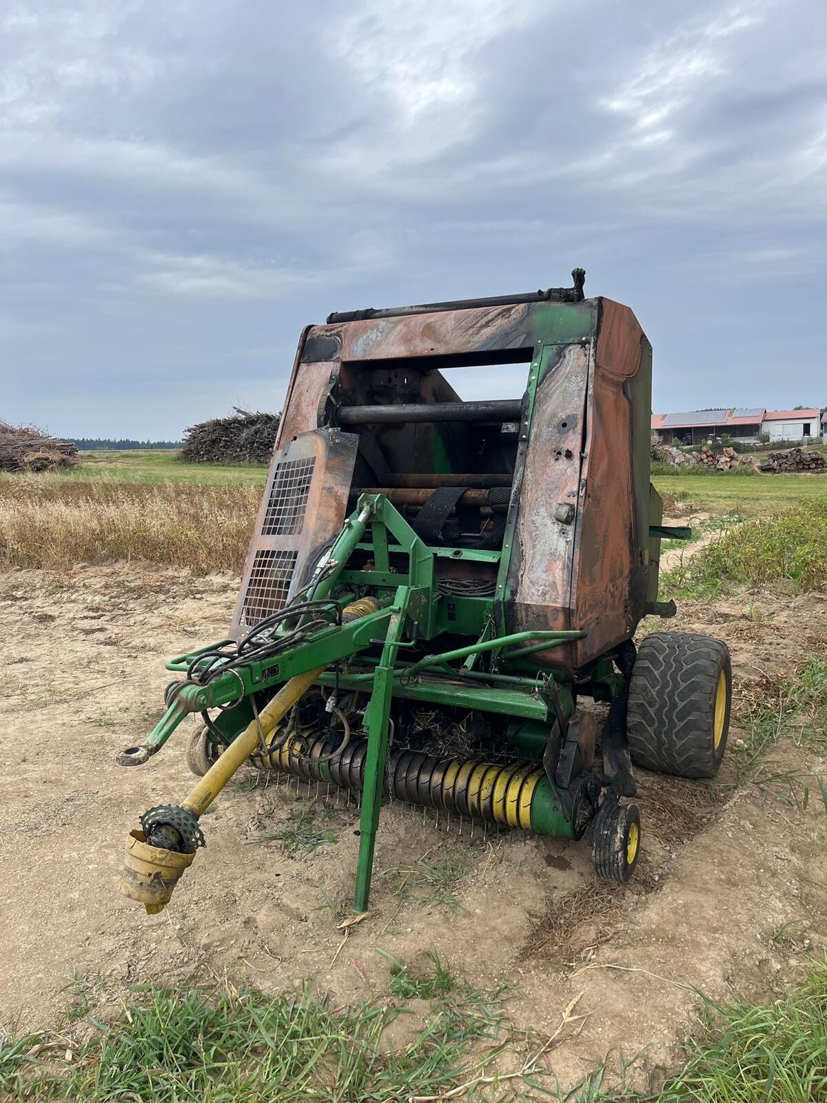 John Deere 582 Brandschaden 1