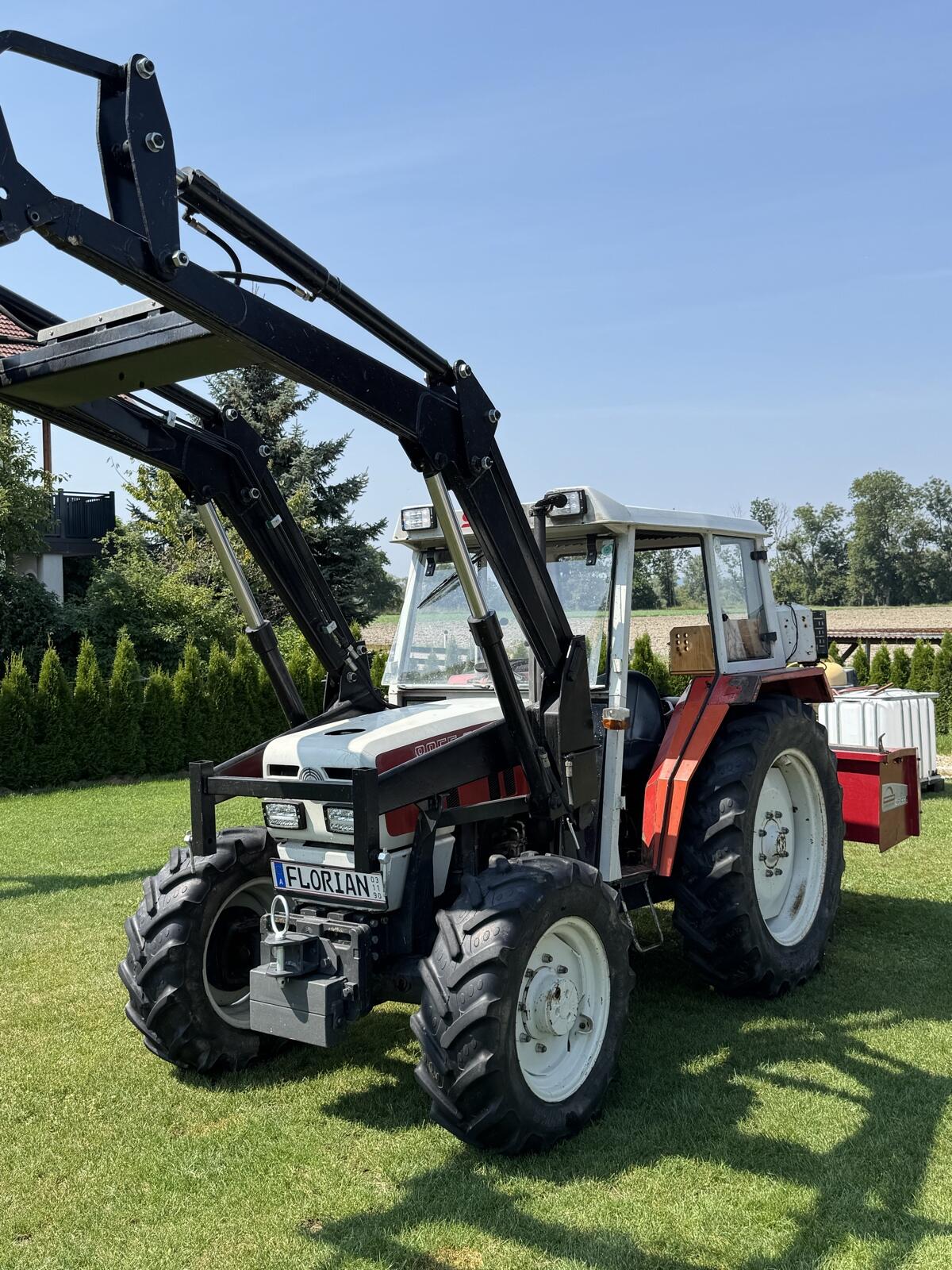 Steyr 8055 A mit vollhydr. FL und Rosensteiner Heckmulde 2