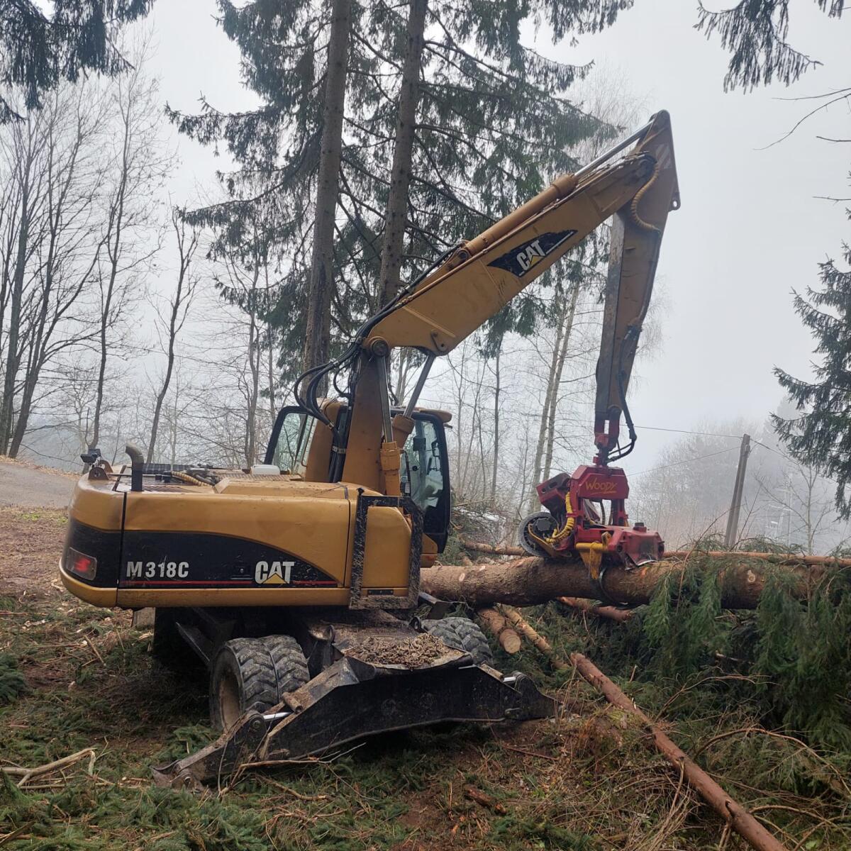 CAT Mobilbagger & Woody 60 2