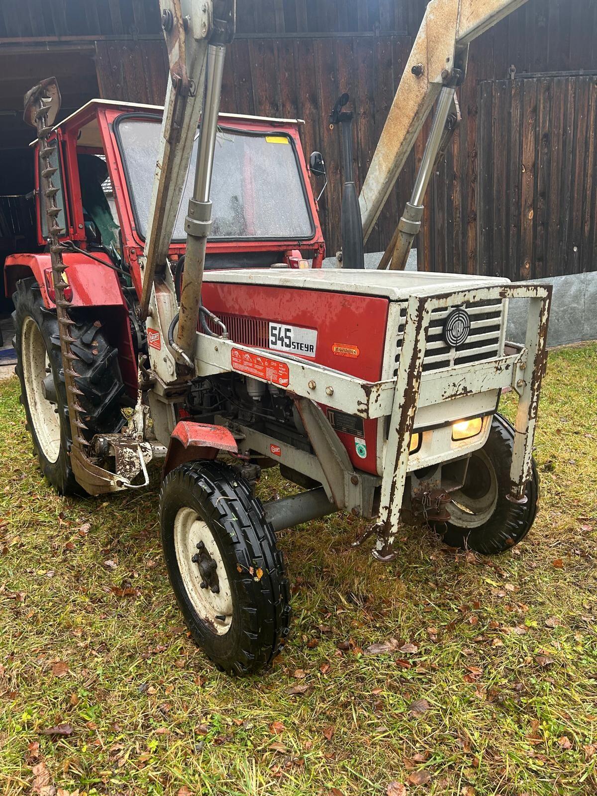 Steyr 545 mit Frontlader und Mähwerk 3