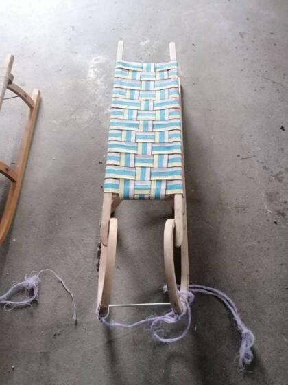 Rodel mit Kindersitz und Fußsack