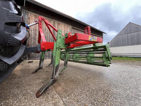 Tiefenlockerer 4 Zinken mit Walze