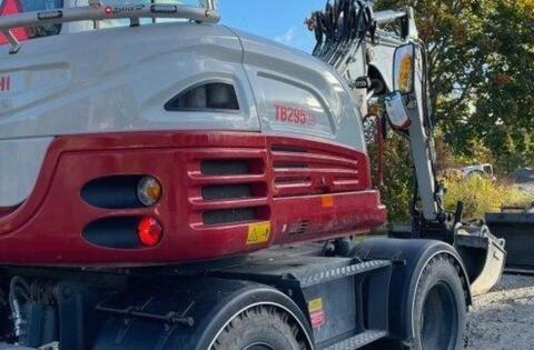 Takeuchi TB295W + Tiltrotator Rototilt R3