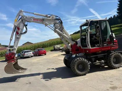Mobilbagger Takeuchi TB 295 W mit Powertilt
