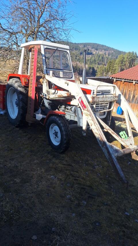 Steyr 545 mit Frontlader und Mähwerk