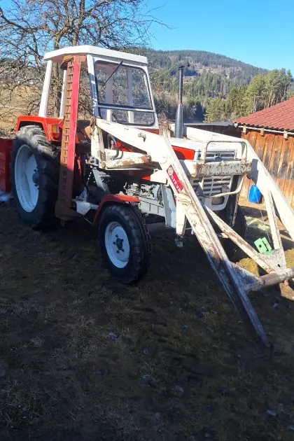 Steyr 545 mit Frontlader und Mähwerk