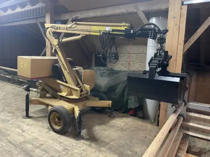 Mistbagger Kran Riener