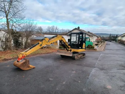 Caterpillar 303.5 3,5t 2 Löffel sind dabei 80er und 30er