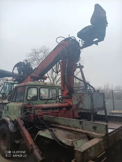 Unimog 406 mit Jonsered Holzkran