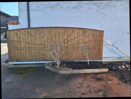 Einfahrtstor el. mit Fernbedienung