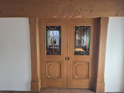 Schiebetüre aus Zirbe inkl. Bleiverglasung