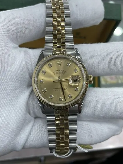 Rolex Datejust 36 Champagnerfarbenes Zifferblatt mit Diamant