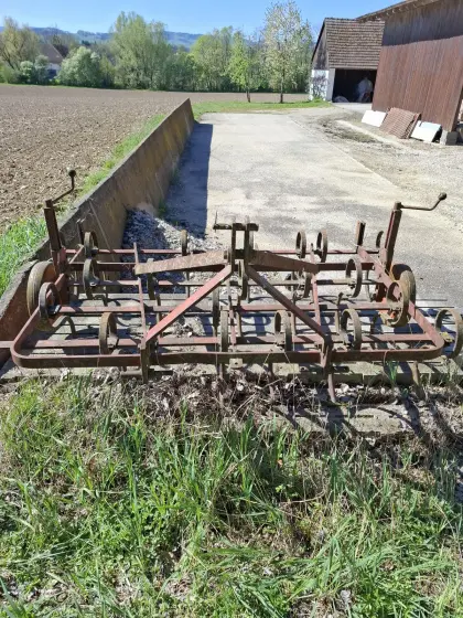 Federzinkengrubber reparaturbedürftig