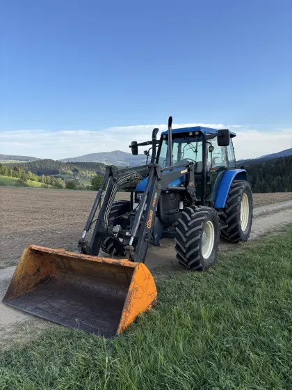 New Holland TS 100 mit Hauer Frontlader TS 100