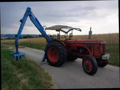 Heckbagger Moser mit Hanomag Brillant