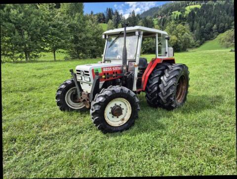 Steyr 8055 mit Hauer Frontladerkonsole
