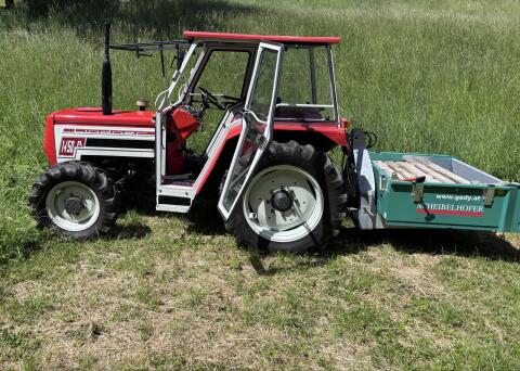 Lindner 1450 Traktor, Mulcher, Kippmulde, Lader