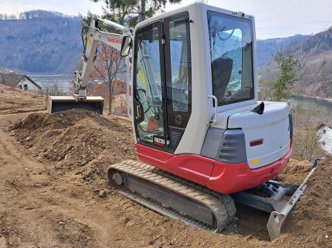 Takeuchi TB235 mit Powertilt und hydr. Schnellwechsler