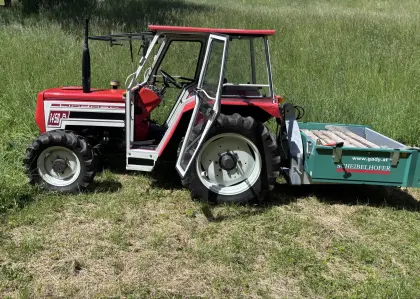 Lindner 1450 Traktor, Mulcher, Kippmulde, Lader