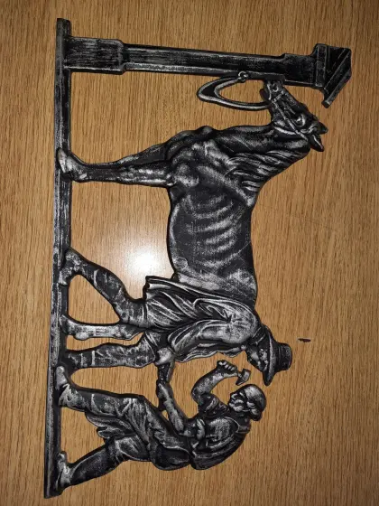 Metallrelief Hufschmied
