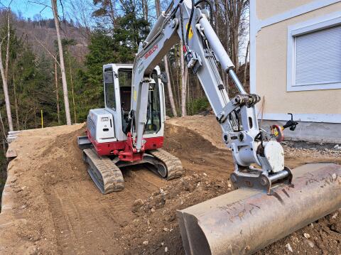 Takeuchi TB235 mit Powertilt und hydr. Schnellwechsler