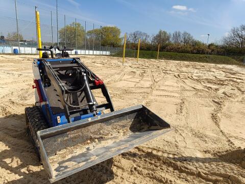 Lader, Minibagger