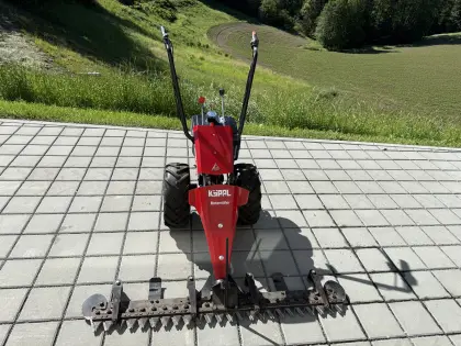 Köppl Motormäher 506 mit Breitreifen und Schneeschild