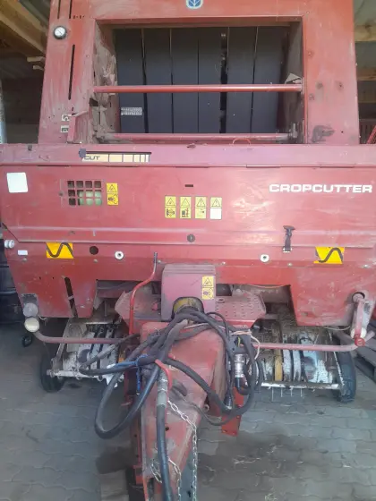 Verkaufe Rundballenpresse New Holland 5980