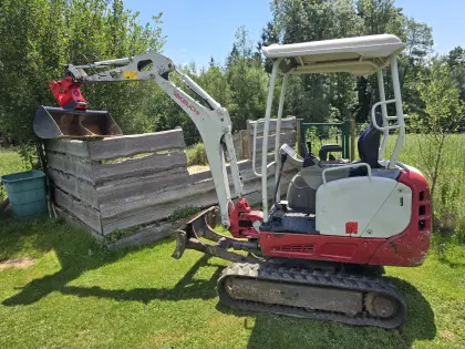 Takeuchi mit Powertilt TB216