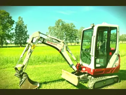 Takeuchi TB216 Bagger mit Anbaugeräten