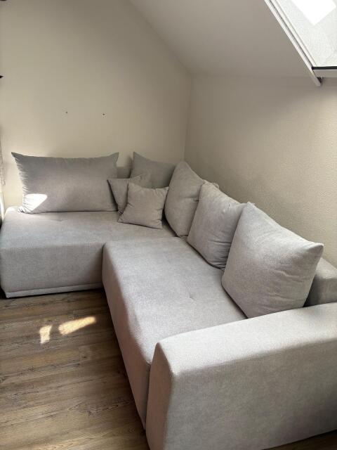 Eckcouch mit Bettfunktion