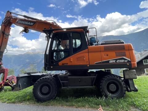 Forstbagger Doosan inkl. Ausschub, Forstwinde und Woody, Doosan DX210W-7