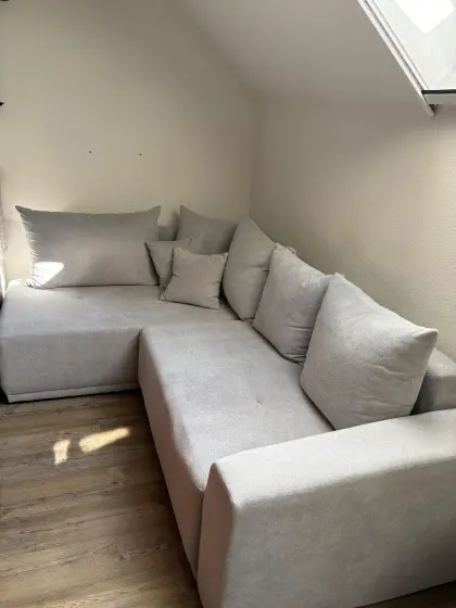 Eckcouch mit Bettfunktion