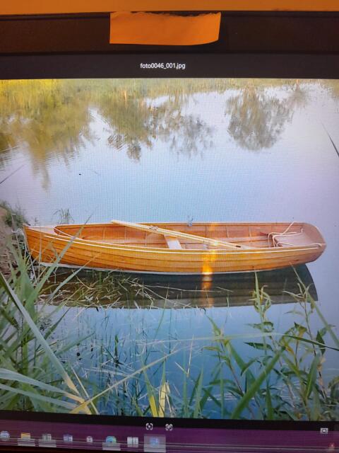 Holzruderboot