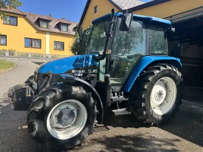 New Holland TL-90 mit Hauer Frontlader und Gewicht, TL-90