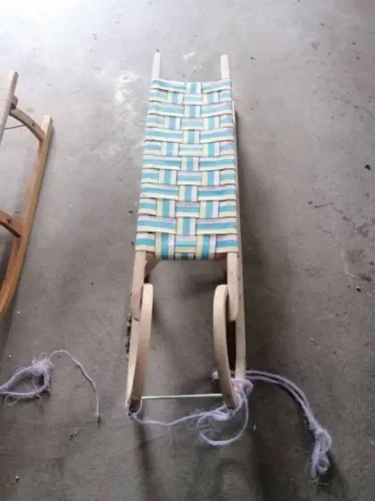 Rodel mit Kindersitz und Fußsack