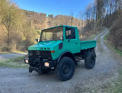Unimog 1.200 Turbo 424 mit Hauer POM 427 Frontlader