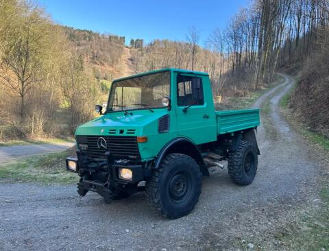 Unimog 1.200 Turbo 424 mit Hauer POM 427 Frontlader