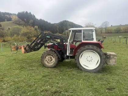 Steyr 8075A Allrad mit Hauer Frontlader, 4 Geräte