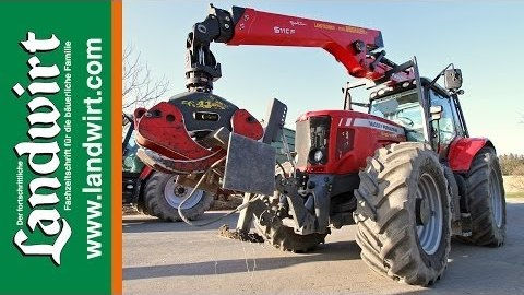 MF 7490 mit Panoramakabine und Forstkran