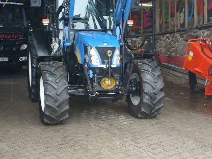 Traktor New Holland TN 70 DA Schlepper