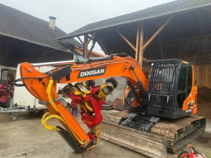 Forstbagger Doosan DX 140-7 mit Woody WH 50-1