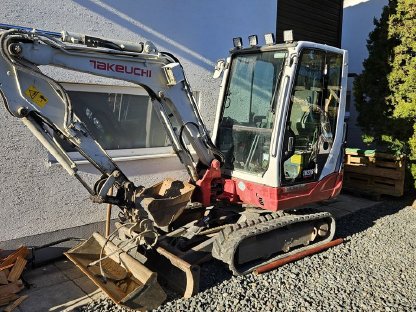 Takeuchi TB228 Minibagger + Autoanhänger Komplettset