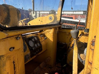 Bild 4:John Deere Laderaupe mit Heckbagger JD 450AA