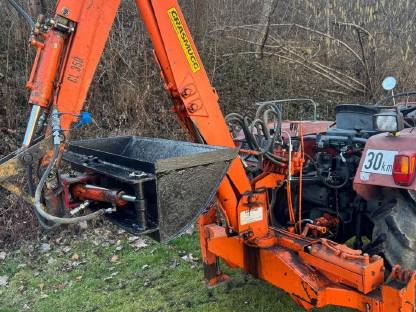 Bild 5:Heckbagger CL350