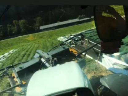 Bild 3:Silierarbeit/Ladewagen