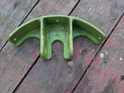 Bild 2:Rundhalterung Claas Halmteiler
