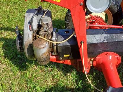 Bild 3:Handbandrechen Pöttinger Heuraupe 160